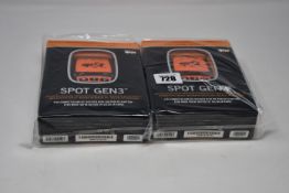 Two boxed as new Spot Gen3 Satellite GPS trackers.