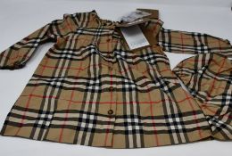 An infants as new Burberry dress (12 months).
