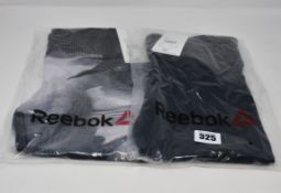 Three as new Reebok TE Linear leggings (2 x M, 1 x L) and two RE tights (S).