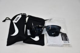Two pairs of as new Nike Maverick sunglasses with pouches (RRP £74 each).