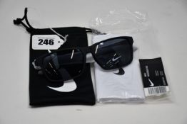A pair of as new Nike Maverick RGE E sunglasses with protective pouch (RRP £137).