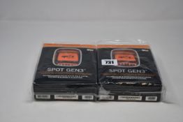 Two boxed as new Spot Gen3 Satellite GPS trackers.