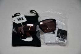 A pair of as new Nike Maverick RGE E sunglasses with protective pouch (RRP £137).