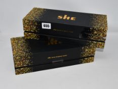 Two boxed as new She Gold Original Hair Styling Irons (IP40M, box slightly damaged).