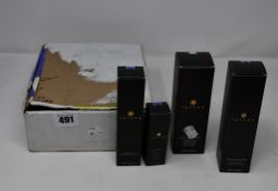 Four boxed as new Tatcha beauty products and related items to include one Tatcha the rice wash