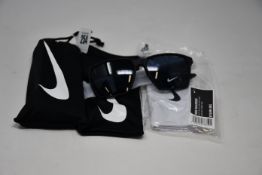 Two pairs of as new Nike Maverick sunglasses with pouches (RRP £74 each).