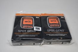 Two boxed as new Spot Gen3 Satellite GPS trackers.