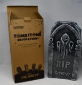 Twelve boxes of as new Tombstone Decorations (Four different spooky designs, approximately 41 x 21 x