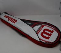Four packs of four Wilson badminton rackets sets.