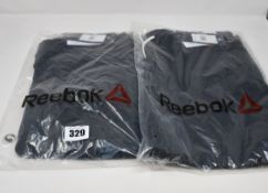 Seven pairs of as new Reebok TE textured logo sweatpants (2 x M, 5 x L).