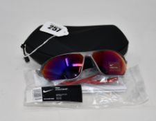 A pair of as new Nike Stratus E sunglasses with case (RRP form £110).