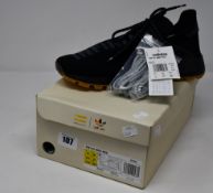 A pair of as new Adidas Pharrell Williams HU NMD PRD trainers (UK 8.5).
