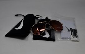 Two pairs of as new Nike Chance sunglasses (RRP £74 each).