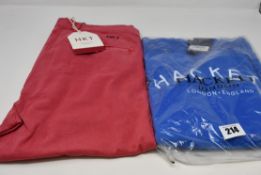 A pair of as new Hackett London stretch chinos (32L) and a Hackett logo crew (11 - 12 years).