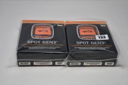 Two boxed as new Spot Gen3 Satellite GPS trackers.