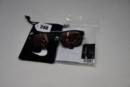 A pair of as new Nike Maverick RGE E sunglasses with protective pouch (RRP £137).