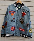 An as new Supreme Nike/NBA Teams Warm-Up jacket in denim (L).