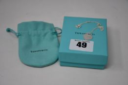 A boxed as new silver 925 Tiffany & Co heart pendant and chain (Chain tangled).