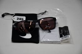 A pair of as new Nike Maverick RGE E sunglasses with protective pouch (RRP £137).