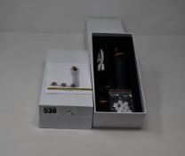 Two boxed as new handheld portable microdermabrasion tools.