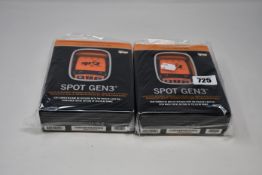 Two boxed as new Spot Gen3 Satellite GPS trackers.