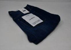 A pair of as new Frame Le Beau jeans in Burnside (Size 25).