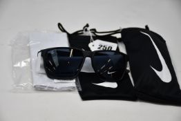 Two pairs of as new Nike Maverick sunglasses with pouches (RRP £74 each).