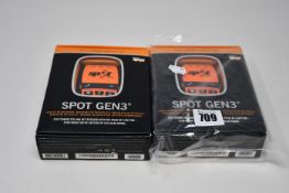 Two boxed as new Spot Gen3 Satellite GPS trackers.