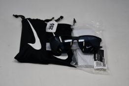 Two pairs of as new Nike Maverick sunglasses with pouches (RRP £74 each).