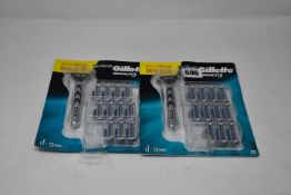 Four boxed as new Gillette Mach 3 Plus twelve blades.