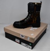 A pair of as new Twin Set leather combat boots with animal print inserts (TG 40 - RRP £195).