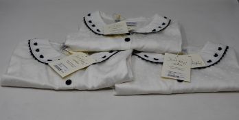 Sixteen girls as new Rachel Riley London Heart embroidered blouses (Assorted sizes from 18M to 10Y -