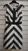 An as new Karl Lagerfeld sleeveless chevron lace dress (Size US 2).