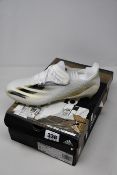 A pair of as new Adidas X Ghosted.1 AG football boots (UK 7).
