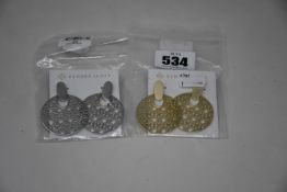 A pair of Kendra Scott Didi 14ct gold plated earrings and a pair of Kendra Scott Rhodium plated
