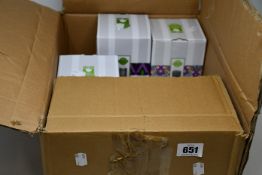 Three Scentsy Mini Warmer base, a Scentsy Dare To Dream, a Scentsy Seashore and a Scentsy Tea