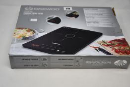 Two boxed as new Inductions hobs to include one Daewoo 2000w induction hob and one Silvercrest
