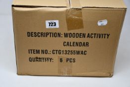 Twelve boxed as new Wood N Fun My First Wooden Activity calendar clocks.