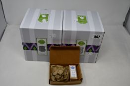 A Scentsy Alabaster, a Scentsy Classic-Curve Gloss grey warmer and a Scentsy Ocean Mist & Aloe