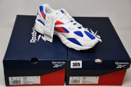 Two pairs of as new Reebok Aztrek 96 trainers (UK 5, 6).