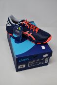 A pair of as new Asics Netburner Super FF 2 trainers (UK 6.5).