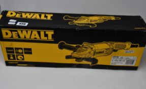 A boxed Dewalt DWE490 angle grinder.