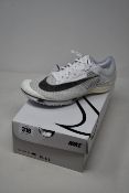 A pair of as new Nike Victory FK running shoe (US 8.5).