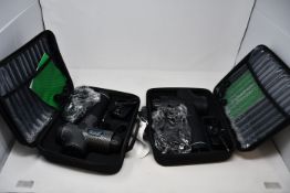 Two as new massage gun and attachment sets.