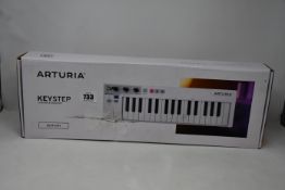 A boxed as new Arturia Keystep MIDI Keystep Keyboard controller and sequencer.