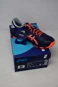 A pair of as new Asics Netburner Super FF 2 trainers (UK 7).