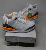 A pair of women's as new Nike Air Jordan 3 Retro Laser Orange trainers (UK 3.5).