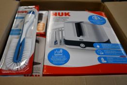 A quantity of Nuk First Choice baby related items to include a Vario Express steam sterilizer,