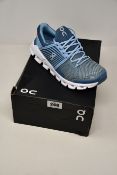 A pair of as new On Running Cloudswift trainers (UK 5).