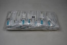 A large quantity of boxed as new Fitbit classic buckle silicone wrist straps in white (Approximately